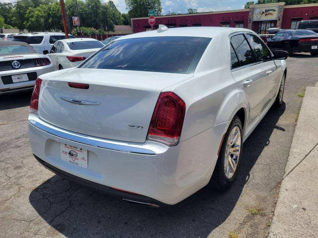 2018 Chrysler 300 for sale at DAGO'S AUTO SALES LLC in Dalton, GA