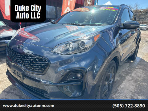 2021 Kia Sportage for sale at Duke City Auto LLC in Gallup NM