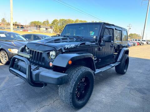 2014 Jeep Wrangler Unlimited for sale at Auto World of Atlanta Inc in Buford GA