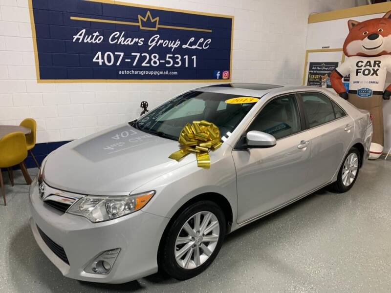 2013 Toyota Camry for sale at Auto Chars Group LLC in Orlando FL