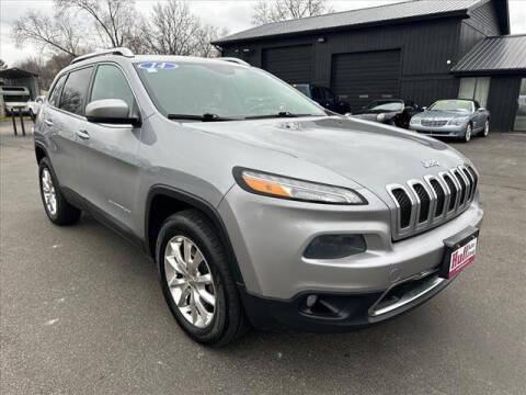 2014 Jeep Cherokee for sale at HUFF AUTO GROUP in Jackson MI