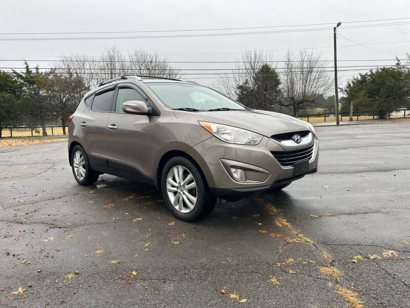 2013 Hyundai Tucson for sale at TRAVIS AUTOMOTIVE in Corryton TN