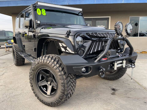 2008 Jeep Wrangler Unlimited for sale at AUTO NATIX in Tulare CA