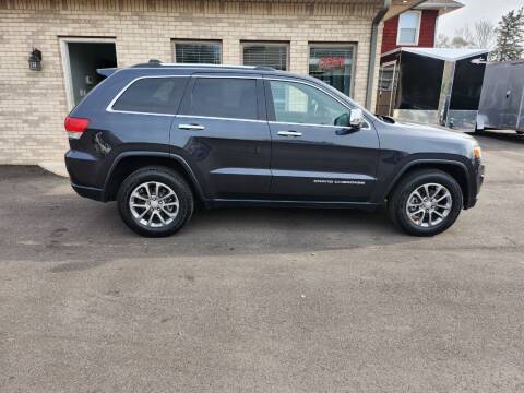 2014 Jeep Grand Cherokee for sale at MADDEN MOTORS INC in Peru IN