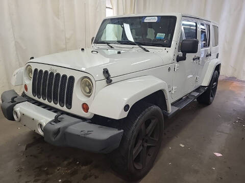 2012 Jeep Wrangler Unlimited for sale at ROADSTAR MOTORS in Liberty Township OH