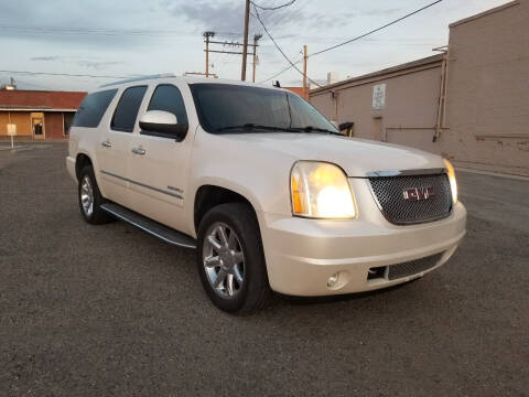 2012 GMC Yukon XL for sale at KHAN'S AUTO LLC in Worland WY