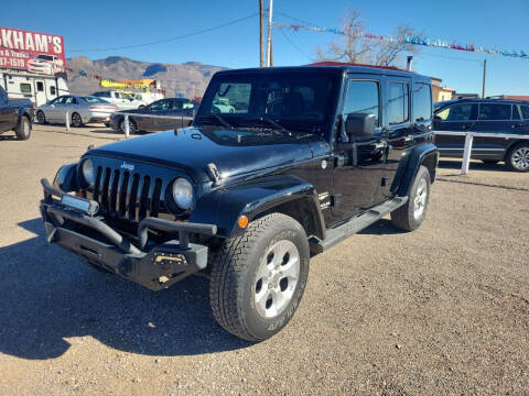 2013 Jeep Wrangler Unlimited for sale at Bickham Used Cars in Alamogordo NM