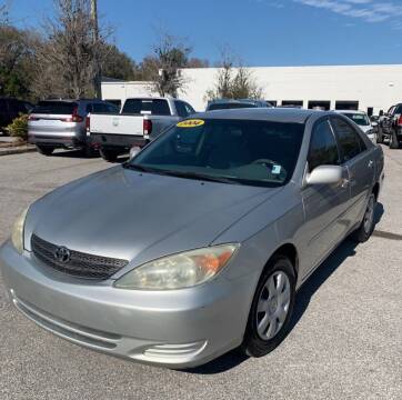 2004 Toyota Camry for sale at TROPICAL MOTOR SALES in Cocoa FL