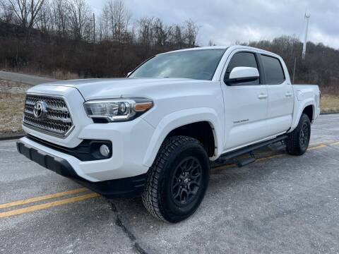 2017 Toyota Tacoma for sale at Jim's Hometown Auto Sales LLC in Cambridge OH
