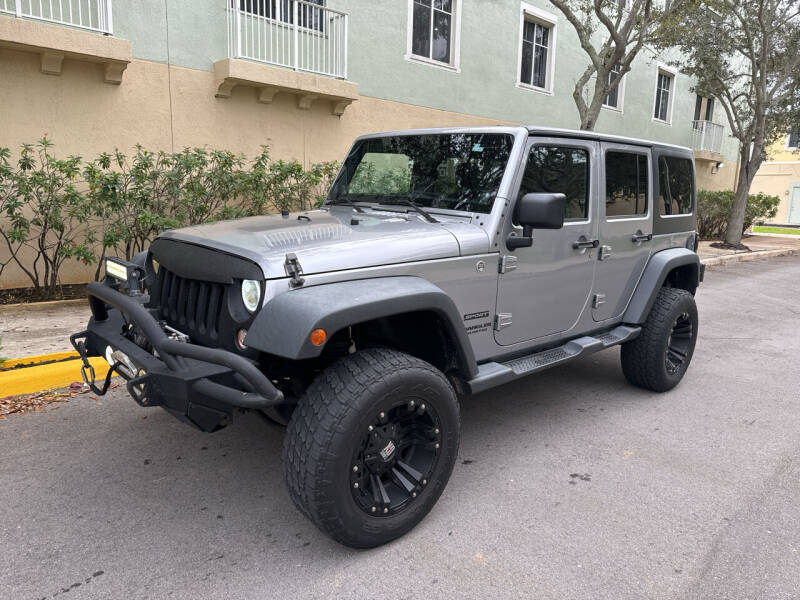 2014 Jeep Wrangler Unlimited for sale at CarMart of Broward in Lauderdale Lakes FL