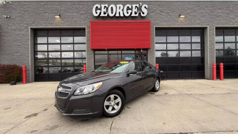 2013 Chevrolet Malibu for sale at George's Used Cars in Brownstown MI