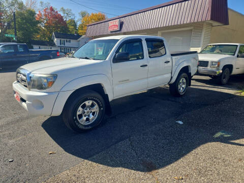 2009 Toyota Tacoma for sale at Maximum Auto Group II INC in Cortland OH