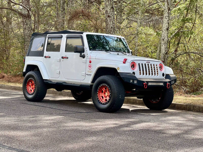 2014 Jeep Wrangler Unlimited for sale at H and S Auto Group in Canton GA