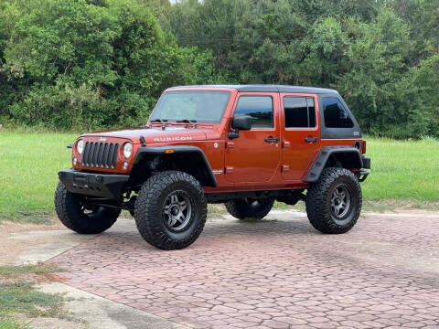 2014 Jeep Wrangler Unlimited for sale at RBP Automotive Inc. in Houston TX