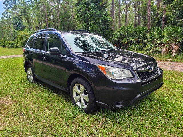 2014 Subaru Forester for sale at Flagler Auto Center in Bunnell, FL