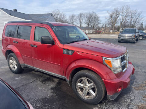 2009 Dodge Nitro for sale at HEDGES USED CARS in Carleton MI