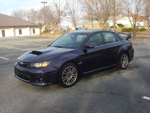 2011 Subaru Impreza for sale at Uniworld Auto Sales LLC. in Greensboro NC