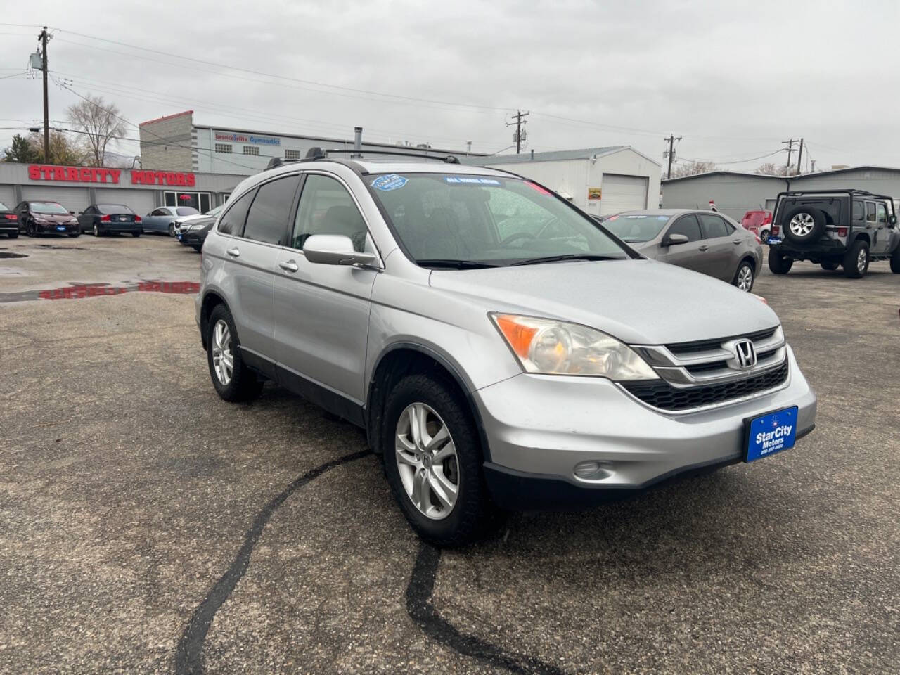 2011 Honda CR-V for sale at Starcity Motors LLC in Garden City, ID