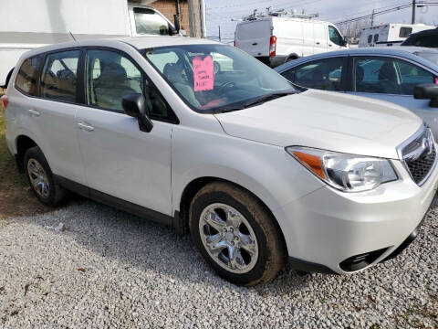 2014 Subaru Forester for sale at TIM'S AUTO SOURCING LIMITED in Tallmadge OH
