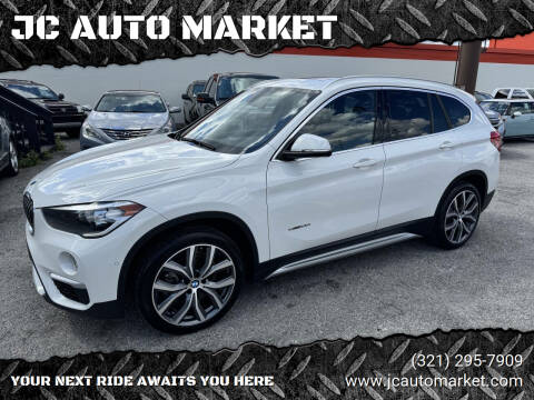 2017 BMW X1 for sale at JC AUTO MARKET in Winter Park FL