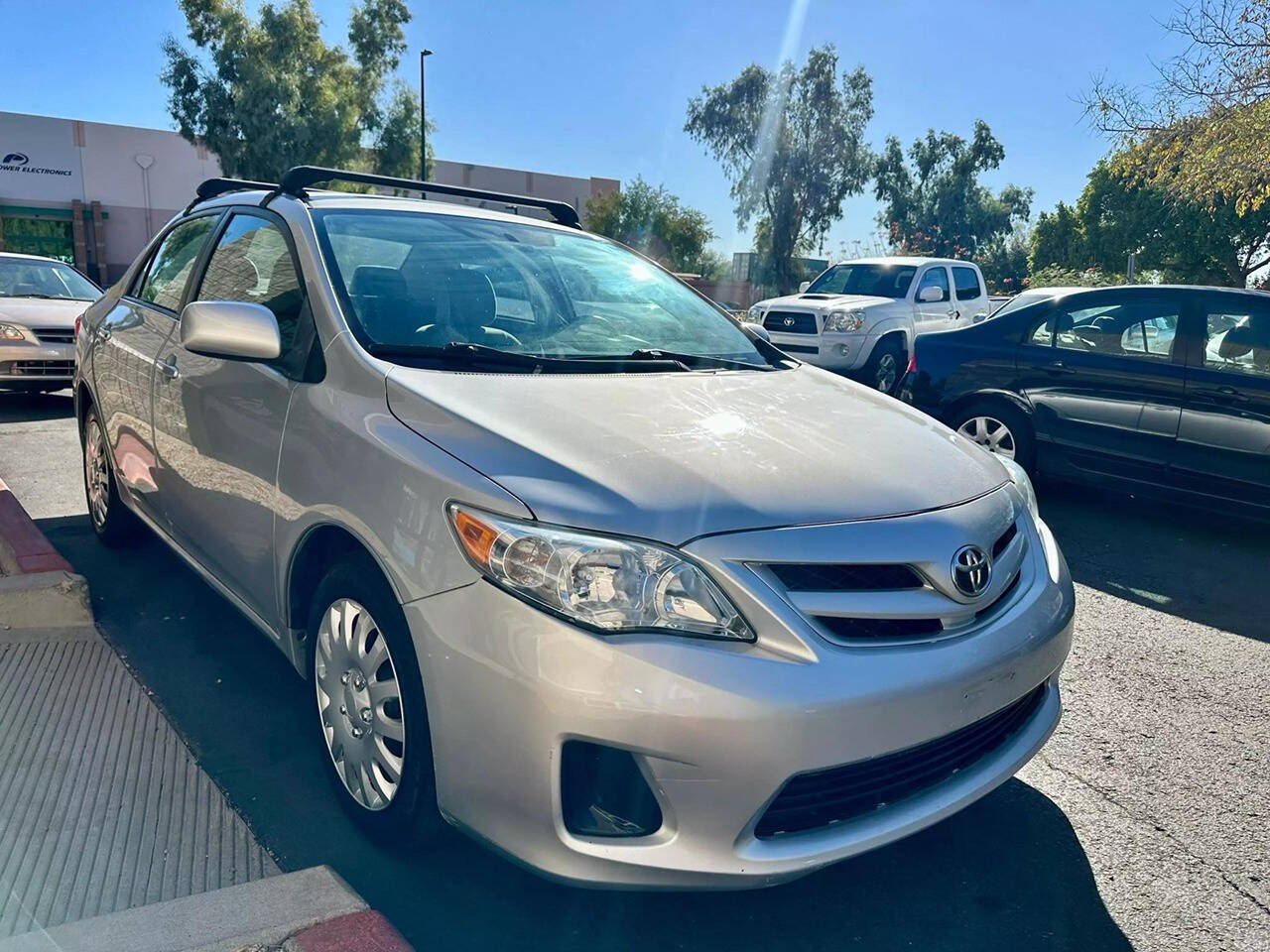 2012 Toyota Corolla for sale at HUDSONS AUTOS in Gilbert, AZ