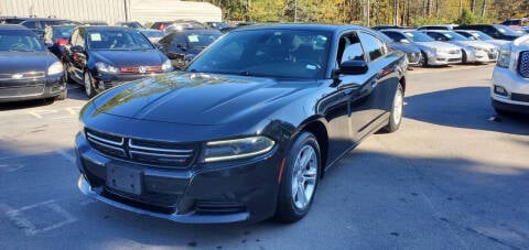 2015 Dodge Charger for sale at GEORGIA AUTO DEALER LLC in Buford GA