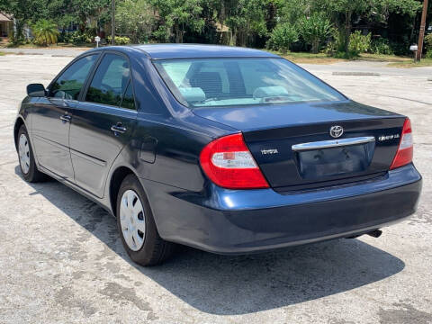 2002 Toyota Camry for sale at LUXURY AUTO MALL in Tampa FL