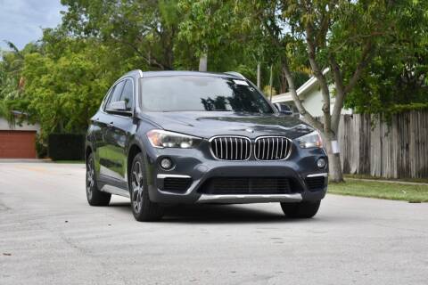2017 BMW X1 for sale at NOAH AUTO SALES in Hollywood FL