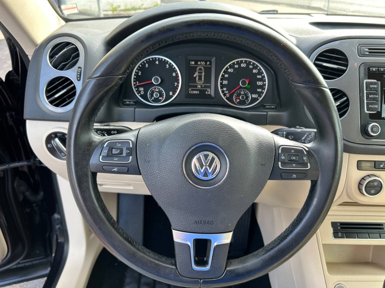 2013 Volkswagen Tiguan for sale at Auto Shop in Wyoming, MI