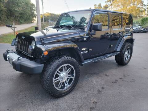 2015 Jeep Wrangler Unlimited for sale at GEORGIA AUTO DEALER, LLC in Buford GA