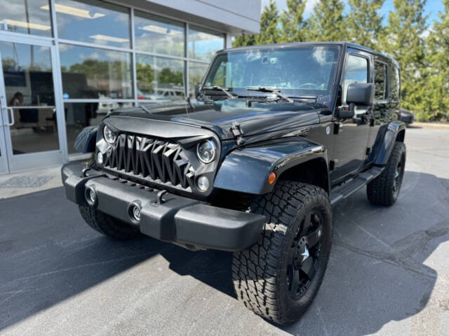 2014 Jeep Wrangler Unlimited for sale at Opus Motorcars in Utica, MI