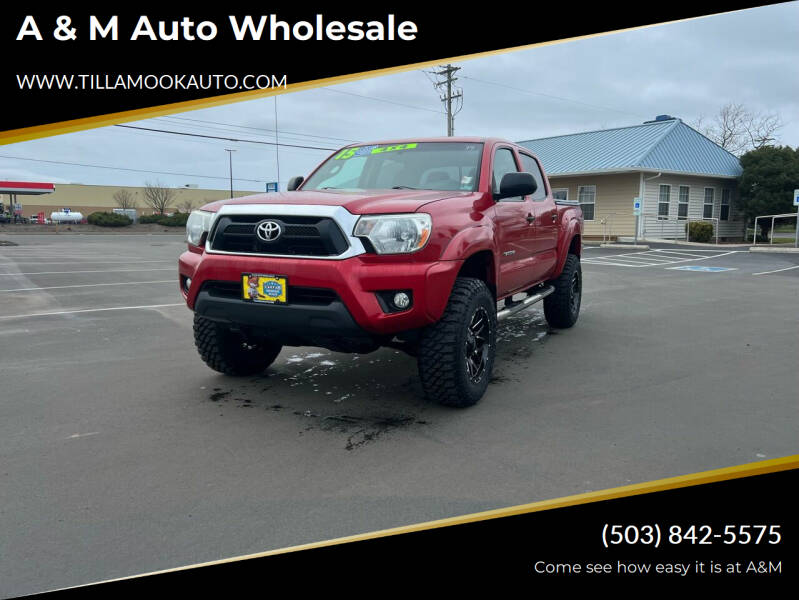 2015 Toyota Tacoma for sale at A & M Auto Wholesale in Tillamook OR