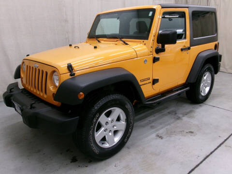 2012 Jeep Wrangler for sale at Paquet Auto Sales in Madison OH