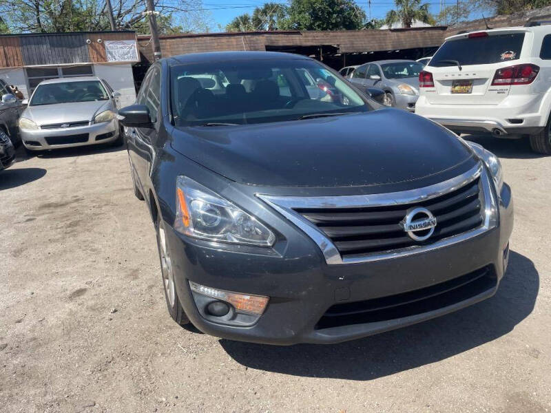 2013 Nissan Altima for sale at STEECO MOTORS in Tampa FL