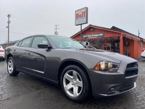 2014 Dodge Charger for sale at HUFF AUTO GROUP in Jackson MI