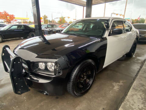 2010 Dodge Charger for sale at Buy-Fast Autos in Houston TX