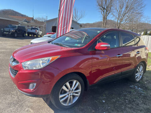 2012 Hyundai Tucson for sale at MYERS PRE OWNED AUTOS & POWERSPORTS in Paden City WV