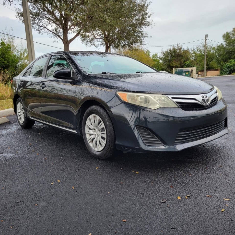 2014 Toyota Camry for sale at VERO APEX in Vero Beach, FL