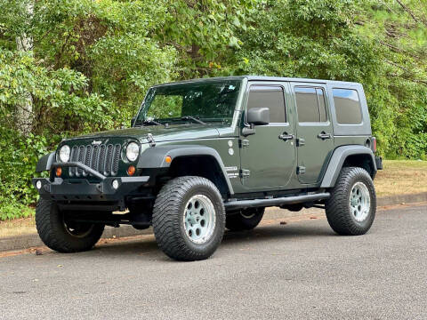 2010 Jeep Wrangler Unlimited for sale at H and S Auto Group in Canton GA