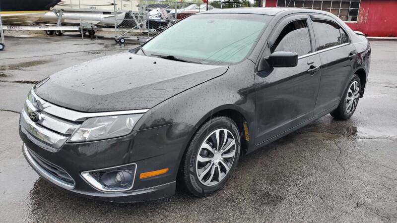 2010 Ford Fusion for sale at GEORGIA AUTO DEALER LLC in Buford GA