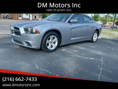 2014 Dodge Charger for sale at DM Motors Inc in Maple Heights OH