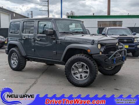 2016 Jeep Wrangler Unlimited for sale at New Wave Auto Brokers & Sales in Denver CO