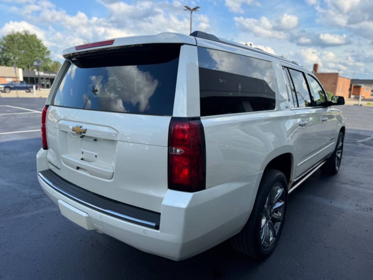 2015 Chevrolet Suburban for sale at Opus Motorcars in Utica, MI