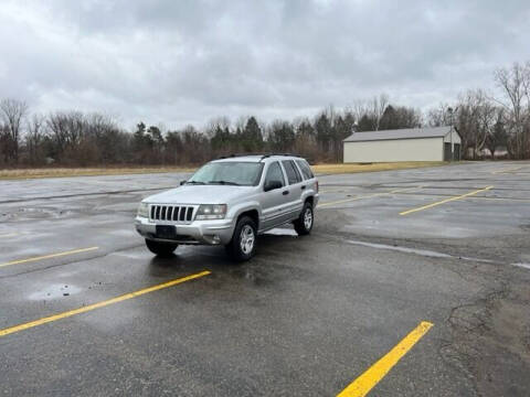 2004 Jeep Grand Cherokee for sale at Caruzin Motors in Flint MI