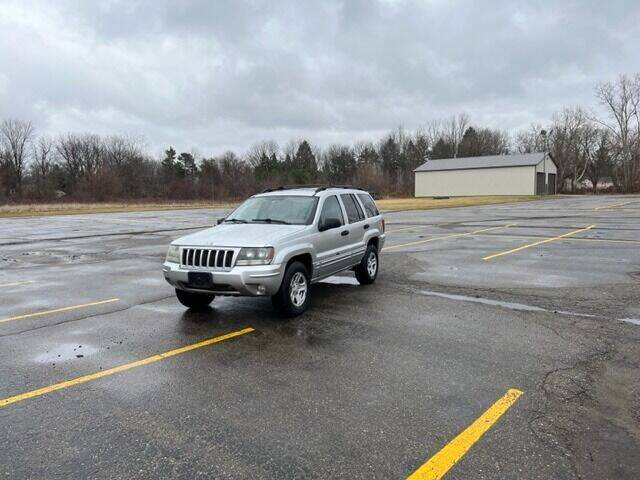 2004 Jeep Grand Cherokee for sale at Caruzin Motors in Flint MI