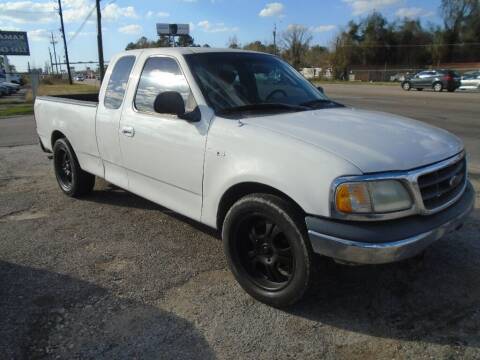 2001 Ford F-150 for sale at SCOTT HARRISON MOTOR CO in Houston TX