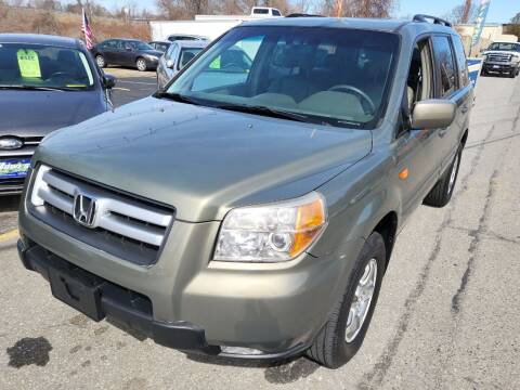 2007 Honda Pilot for sale at Howe's Auto Sales in Lowell MA