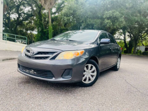 2011 Toyota Corolla for sale at Carnaval Auto Group LLC in Tampa FL