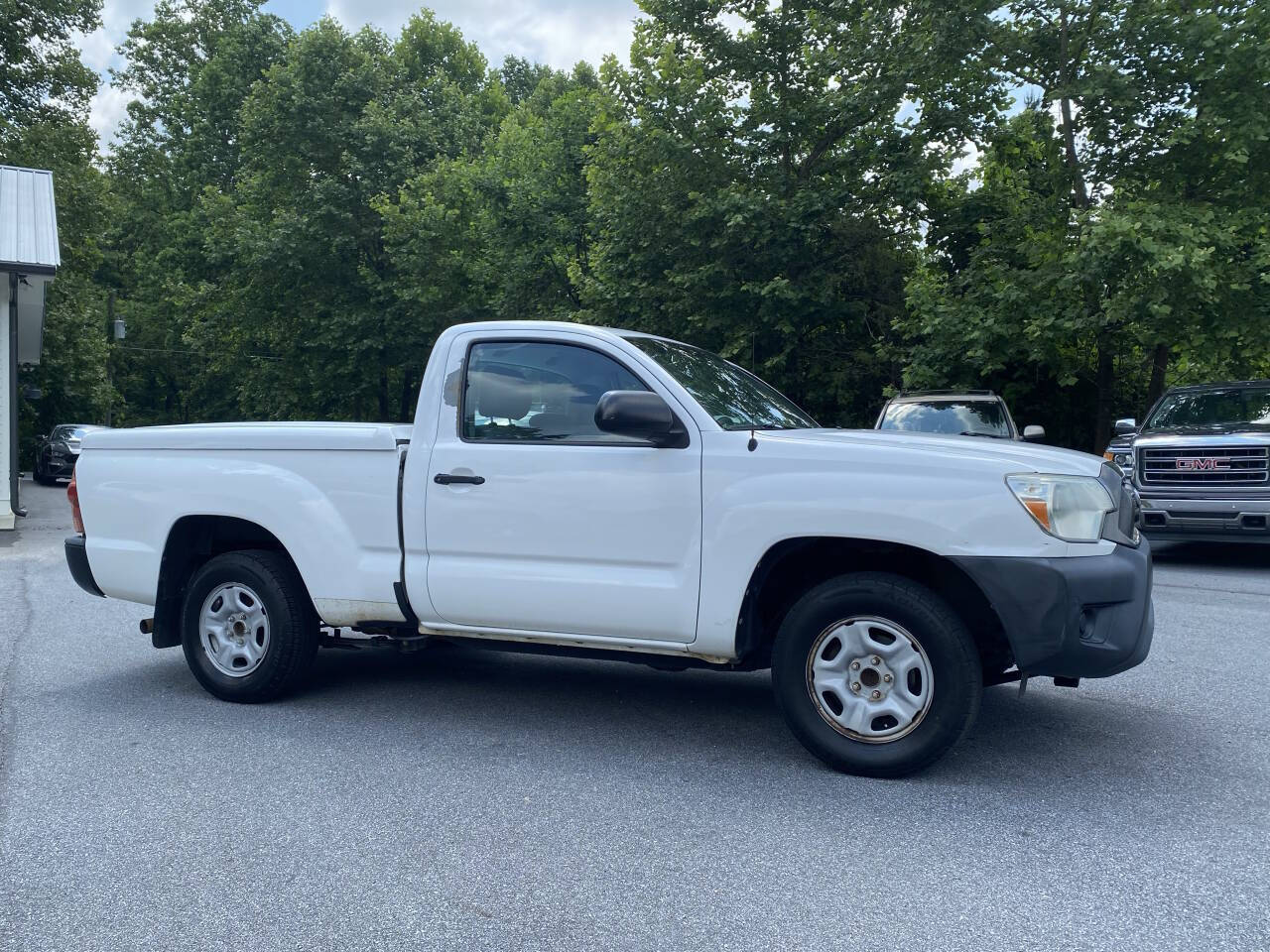 White 2014 Toyota Tacoma Base 4x2 Base 2dr Regular Cab 6.1 ft SB 4A 2