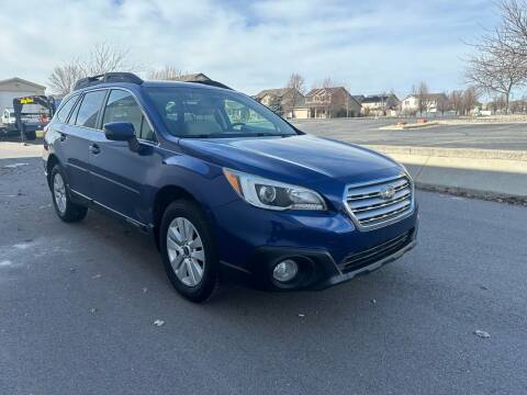 2016 Subaru Outback for sale at The Car-Mart in Bountiful UT